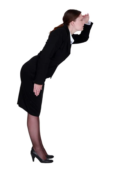 Businesswoman looking for something — Stock Photo, Image