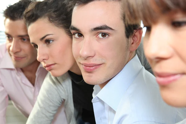 Closeup of 's faces in an office — Stock Photo, Image