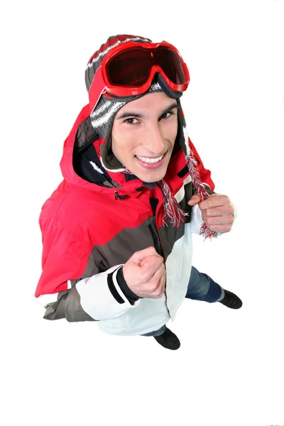 Mladý muž v lyžařské oblečení — Stock fotografie