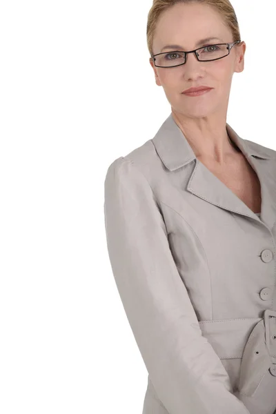 Fechar-se de um executivo feminino em óculos — Fotografia de Stock