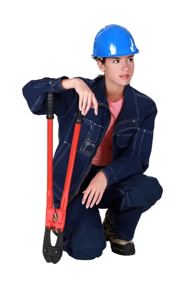 Kobieta robotnik z szczypce. — Zdjęcie stockowe