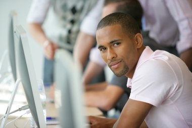 Casual office workers sat in a row clipart