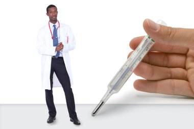 Black doctor with giant white hand resting on table holding thermometer bes clipart