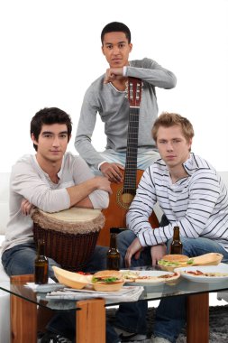 Young men with musical instruments clipart