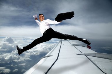 Businessman in the sky clipart