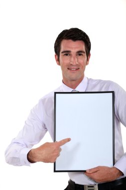 Man holding up a blank bulletin board clipart