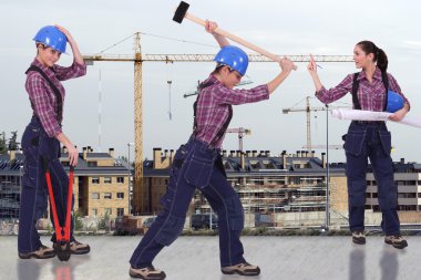 Female builder with construction site in background clipart