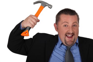 A foolish business man with a hammer clipart