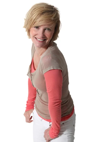 Studio portrait of a smiling blonde woman in her thirties — Stock Photo, Image