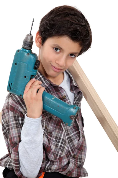 Young boy pretending to be a tradesman — Stock Photo, Image