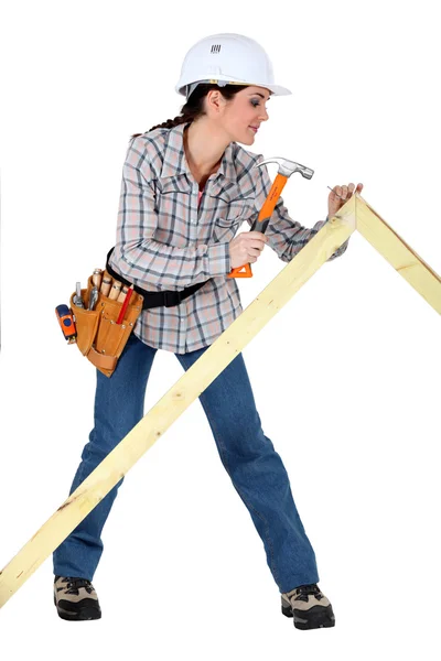 Mulher construindo uma moldura — Fotografia de Stock
