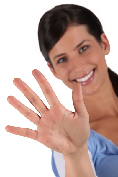 Woman holding up her hand — Stock Photo, Image