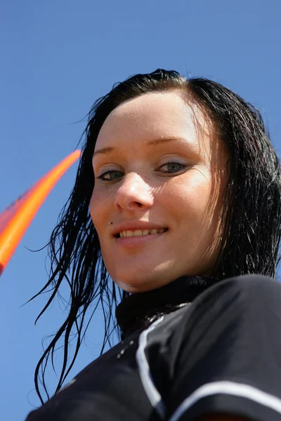 Closeup of a female surfer — Stock Photo, Image