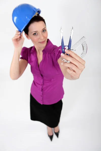 Architect holding compass and protractor — Stock Photo, Image