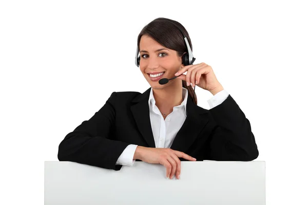 Receptionist with headset — Stock Photo, Image