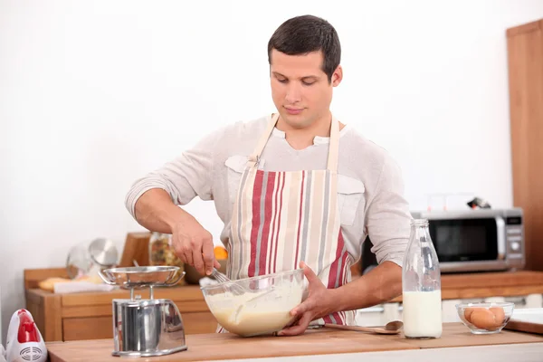 Man stirring mixture in bowl — Stock Photo, Image