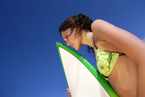 Woman with surfboard — Stock Photo, Image