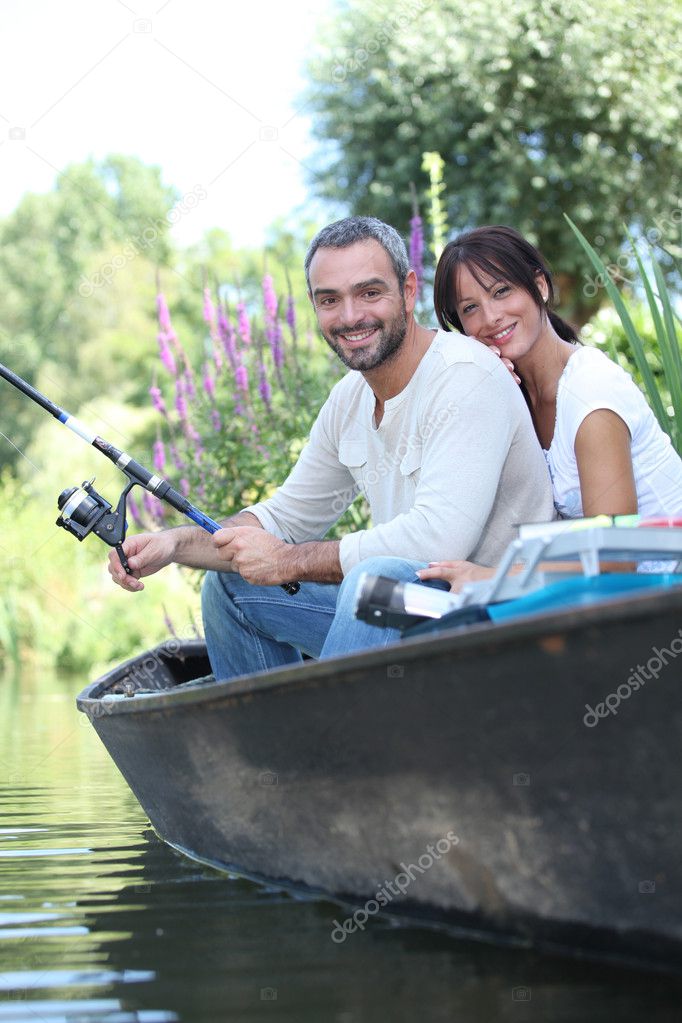 http://static8.depositphotos.com/1192060/906/i/950/depositphotos_9061457-Couple-fishing-in-a-boat.jpg