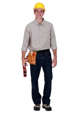 Carpenter stood holding wood plane clipart