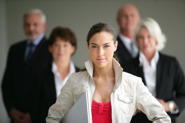 Young businesswoman leader of a business team clipart