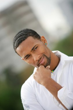 Portrait of a young man metis smiling clipart