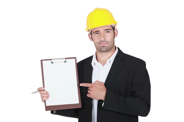 Worker holding clipboard — Stok fotoğraf