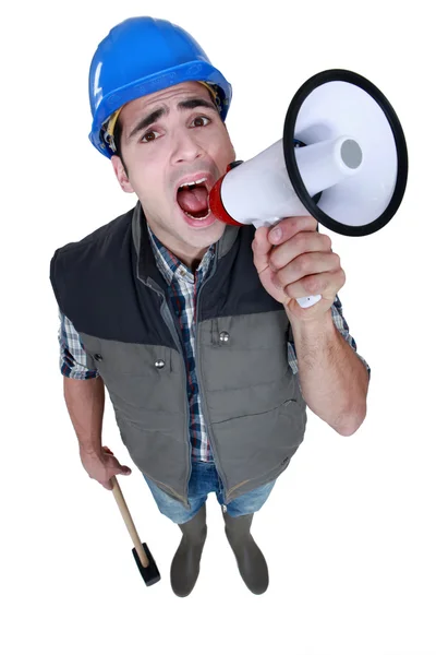 Builder with megaphone — Stock Photo, Image