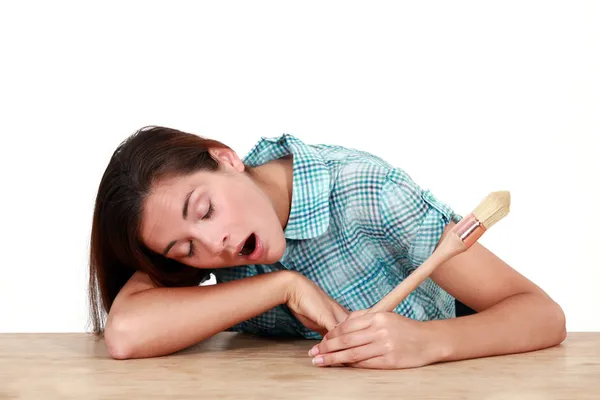 An exhausted female painter. — Stock Photo, Image