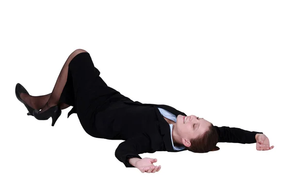 Affärskvinna liggande på golvet — Stockfoto