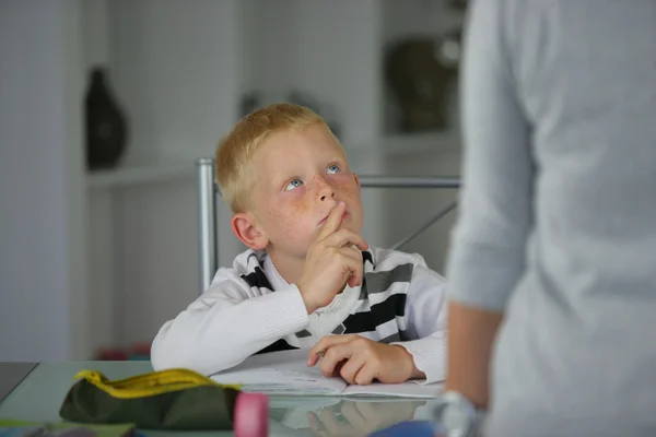 Little concentrating on his homework — Stock Photo, Image