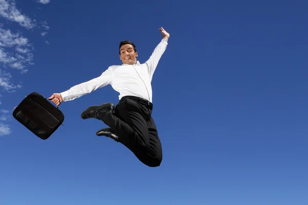 Heureux homme d'affaires sautant dans les airs — Photo