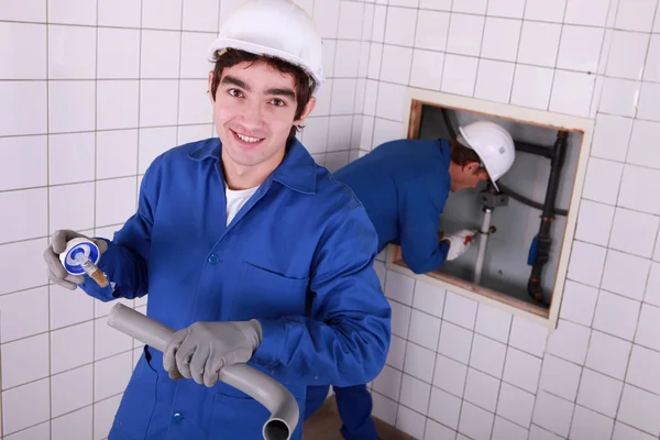 stock image Portrait of a young plumber