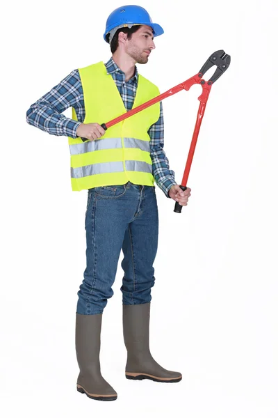 Man holding bolt cutters — Stock Photo, Image