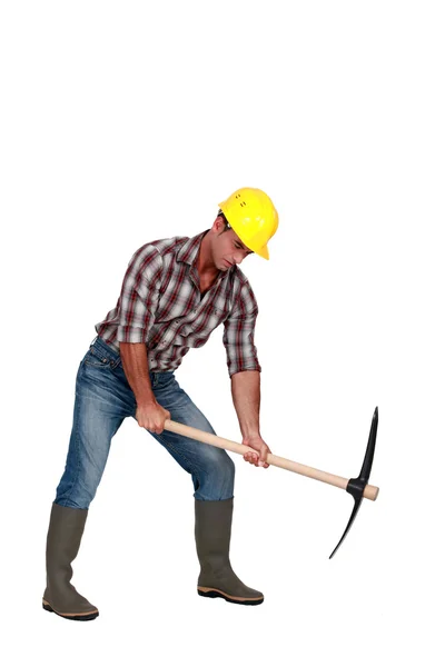 Man with a pickaxe — Stock Photo, Image