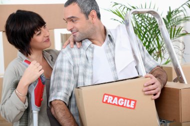Couple moving into new home clipart