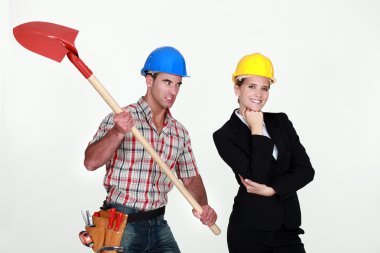 Construction worker preparing to hit an engineer over the head clipart