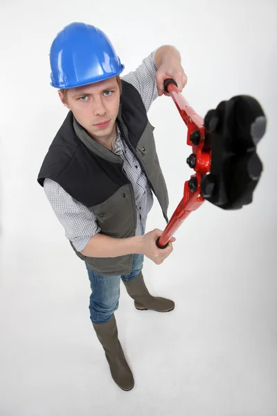 High angle shot of craftsman holding wrench — Stock Photo, Image