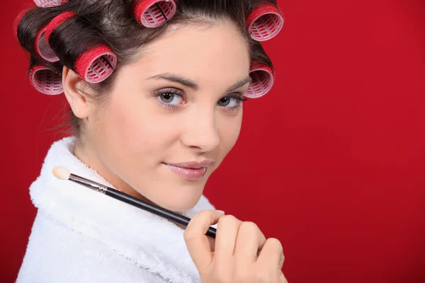 Woman with her hair in rollers — Stock Photo, Image