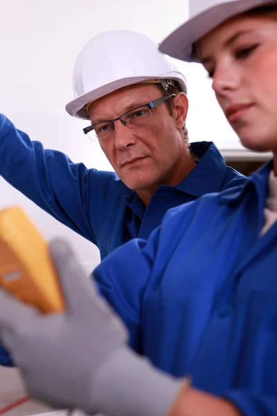 Male and female blue workers — Stock Photo, Image
