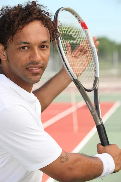 Tennis player on hard court — Stock Photo, Image