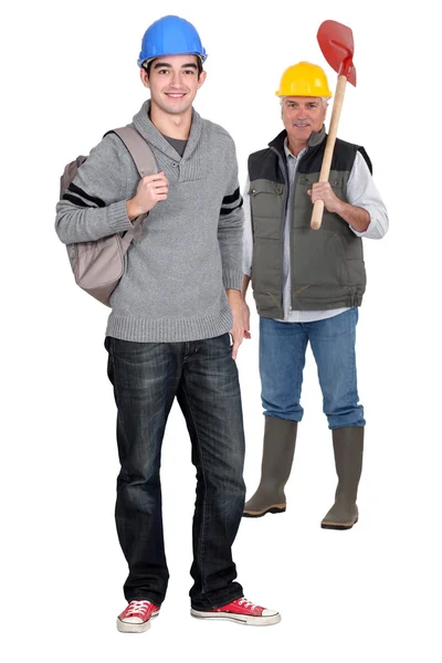 Manual worker with young apprentice — Stock Photo, Image