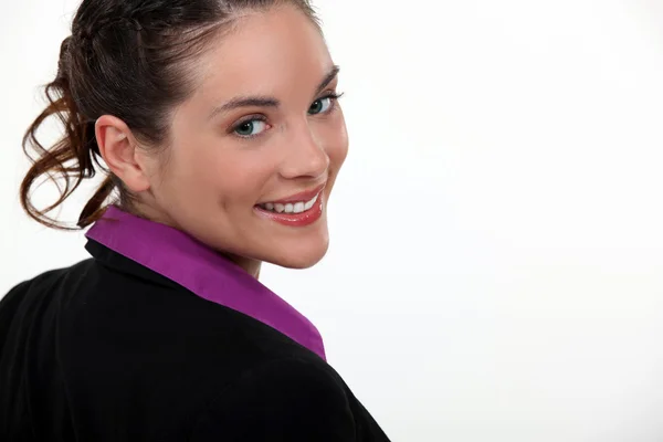 Charming woman in a suit smiling — Stock Photo, Image