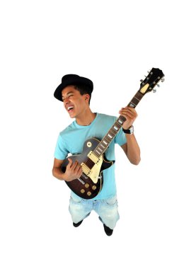 Young man playing a guitar clipart