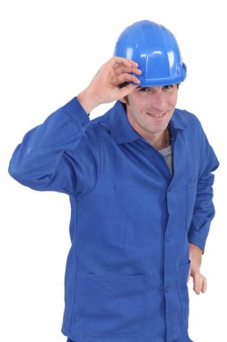 Smiling workman on white background clipart