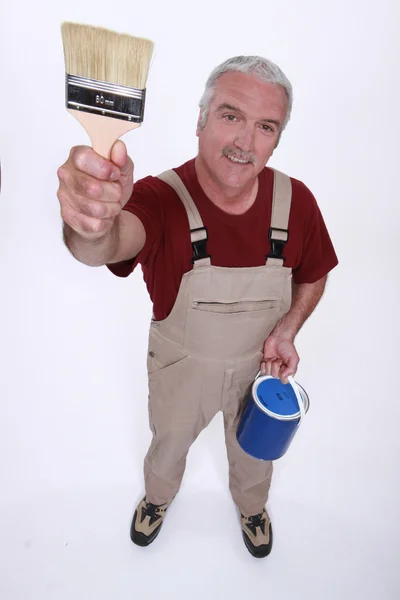 Old handyman with paintbrush — Stock Photo, Image
