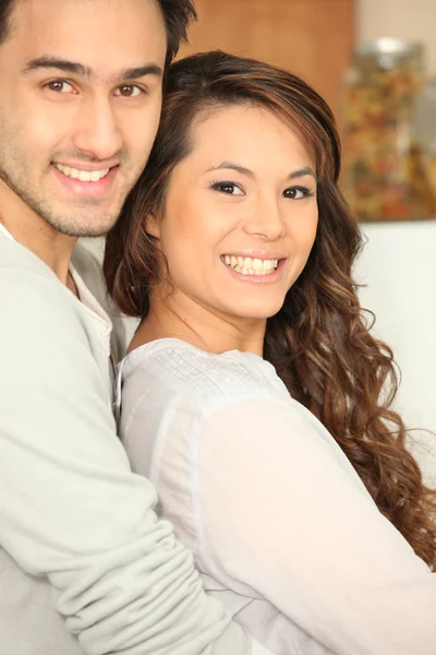 Smiling couple indoors — Stock Photo, Image