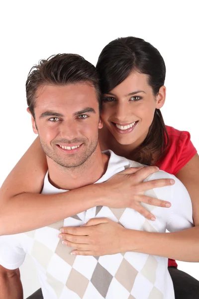 Wrapping arms around boyfriend — Stock Photo, Image