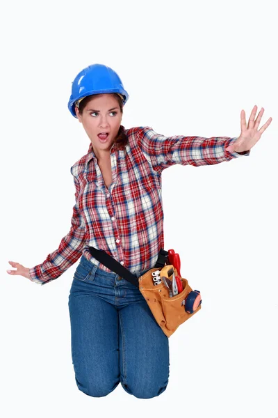 Female laborer doing sign with her hand — Stock Photo, Image