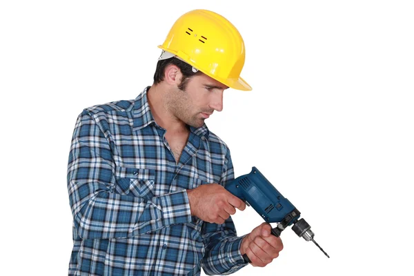 Handyman utilizzando trapano elettrico — Foto Stock