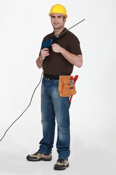 Builder holding drill — Stock Photo, Image